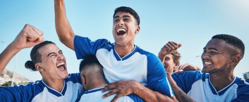 teammates cheer after a win